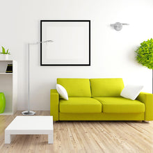 Load image into Gallery viewer, Dessau Turbo LED Wall Light in living room.