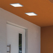 Load image into Gallery viewer, Trave Outdoor LED Patio Light in hallway.