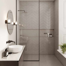 Load image into Gallery viewer, Aquina Bath Wall Light in bathroom.