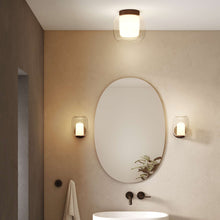 Load image into Gallery viewer, Aquina LED Semi Flush Mount Ceiling Light in bathroom.