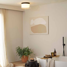 Load image into Gallery viewer, Aquina LED Semi Flush Mount Ceiling Light in bathroom.
