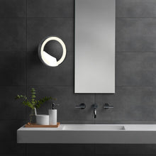 Load image into Gallery viewer, Catena LED Magnifying Wall Mirror in bathroom.