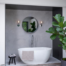 Load image into Gallery viewer, Elena Wall Light in bathroom.