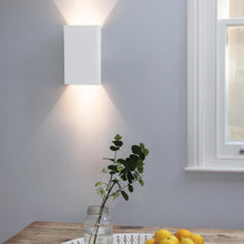 Load image into Gallery viewer, Rio LED Wall Light in living room.