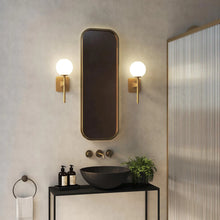 Load image into Gallery viewer, Tacoma Wall Light in bathroom.