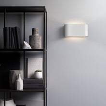 Load image into Gallery viewer, Velo LED Wall Light in living room.