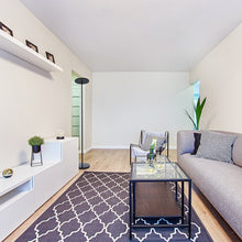 Load image into Gallery viewer, Athena LED Floor Lamp in living room.