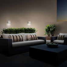 Load image into Gallery viewer, Atlantis Outdoor LED Wall Light in Outdoor Area.