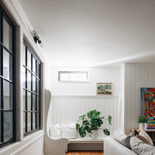 Load image into Gallery viewer, Atlas Wall Light in living room.