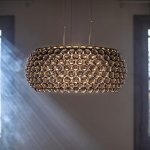 Load image into Gallery viewer, Caboche Plus Grande LED Pendant Light in dining room.