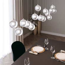 Load image into Gallery viewer, Champagne Bubbles LED Pendant Light in dining room.