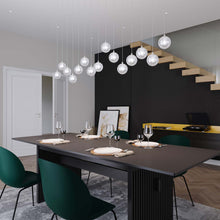 Load image into Gallery viewer, Champagne Bubbles LED Pendant Light in dining room.