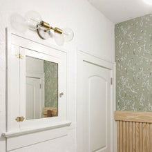 Load image into Gallery viewer, Chloe Wall Light in bathroom.