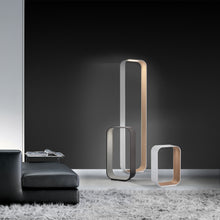 Load image into Gallery viewer, Contour LED Table Lamp in living room.