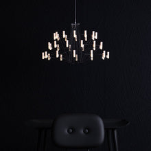 Load image into Gallery viewer, Coppelia LED Chandelier in dining room.
