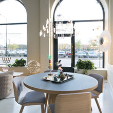 Load image into Gallery viewer, Coppelia LED Chandelier in dining room.