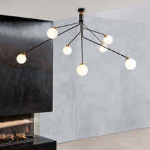 Load image into Gallery viewer, Array Opal Pendant Light in living room.
