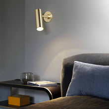 Load image into Gallery viewer, Heron LED Wall Light in bedroom.