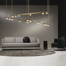Load image into Gallery viewer, Modulo Linear LED Pendant Light in living room.