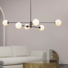 Load image into Gallery viewer, Trevi Pendant Light in living room.