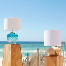 Load image into Gallery viewer, Ballard Table Lamp in Outside Area.