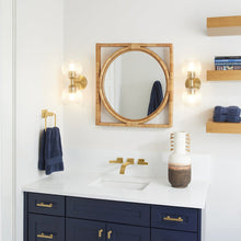 Load image into Gallery viewer, Helios Wall Light in bathroom.