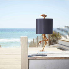 Load image into Gallery viewer, Ibis Table Lamp in Outside Area.