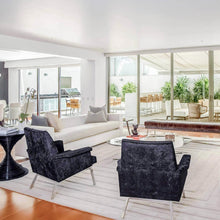 Load image into Gallery viewer, Scope LED Gimble Recessed Light in living room.
