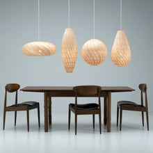 Load image into Gallery viewer, Ebb LED Bounce Pendant Light in dining room.