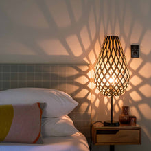 Load image into Gallery viewer, Koura Table Lamp in bedroom.