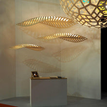 Load image into Gallery viewer, Navicula LED Pendant Light in living room.