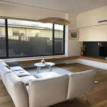 Load image into Gallery viewer, Navicula LED Pendant Light in living room.