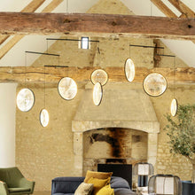 Load image into Gallery viewer, Focus LED Chandelier in living room.