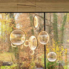 Load image into Gallery viewer, Focus LED Chandelier in living room.