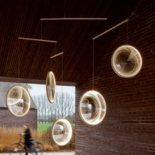 Load image into Gallery viewer, Focus LED Chandelier in living room.