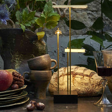 Load image into Gallery viewer, Knokke LED Table Lamp in living room.