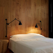 Load image into Gallery viewer, Lampe Gras N°210 Swing Arm LED Wall Light in bedroom.