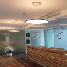 Load image into Gallery viewer, Discovery LED Suspension Light in living room.