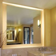 Load image into Gallery viewer, Serenity LED Lighted Mirror in bathroom.