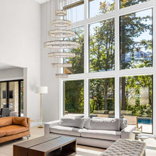 Load image into Gallery viewer, Monroe LED Chandelier in living room.