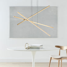 Load image into Gallery viewer, Essence Trio LED Linear Chandelier in office.