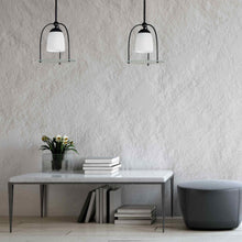 Load image into Gallery viewer, Focal Point LED Pendant Light in living room.