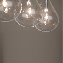 Load image into Gallery viewer, Larmes Linear Pendant Light in dining room.