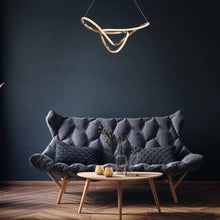 Load image into Gallery viewer, Perpetual LED Pendant Light in living room.