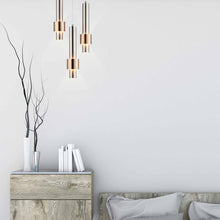 Load image into Gallery viewer, Reveal LED Multi Light Pendant Light in living room.