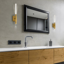 Load image into Gallery viewer, Benicio LED Wall Light in bathroom.