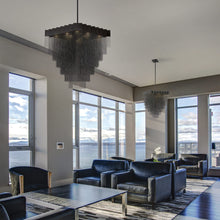 Load image into Gallery viewer, Bloomfield Oval LED Chandelier in living room.