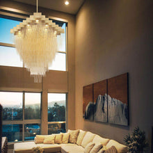 Load image into Gallery viewer, Bloomfield Oval LED Chandelier in living room.