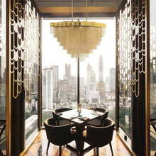 Load image into Gallery viewer, Bloomfield Oval LED Chandelier in restaurant.