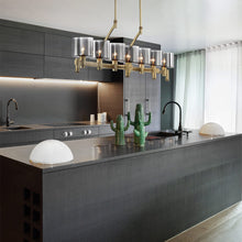 Load image into Gallery viewer, Decato Linear Pendant Light in kitchen.